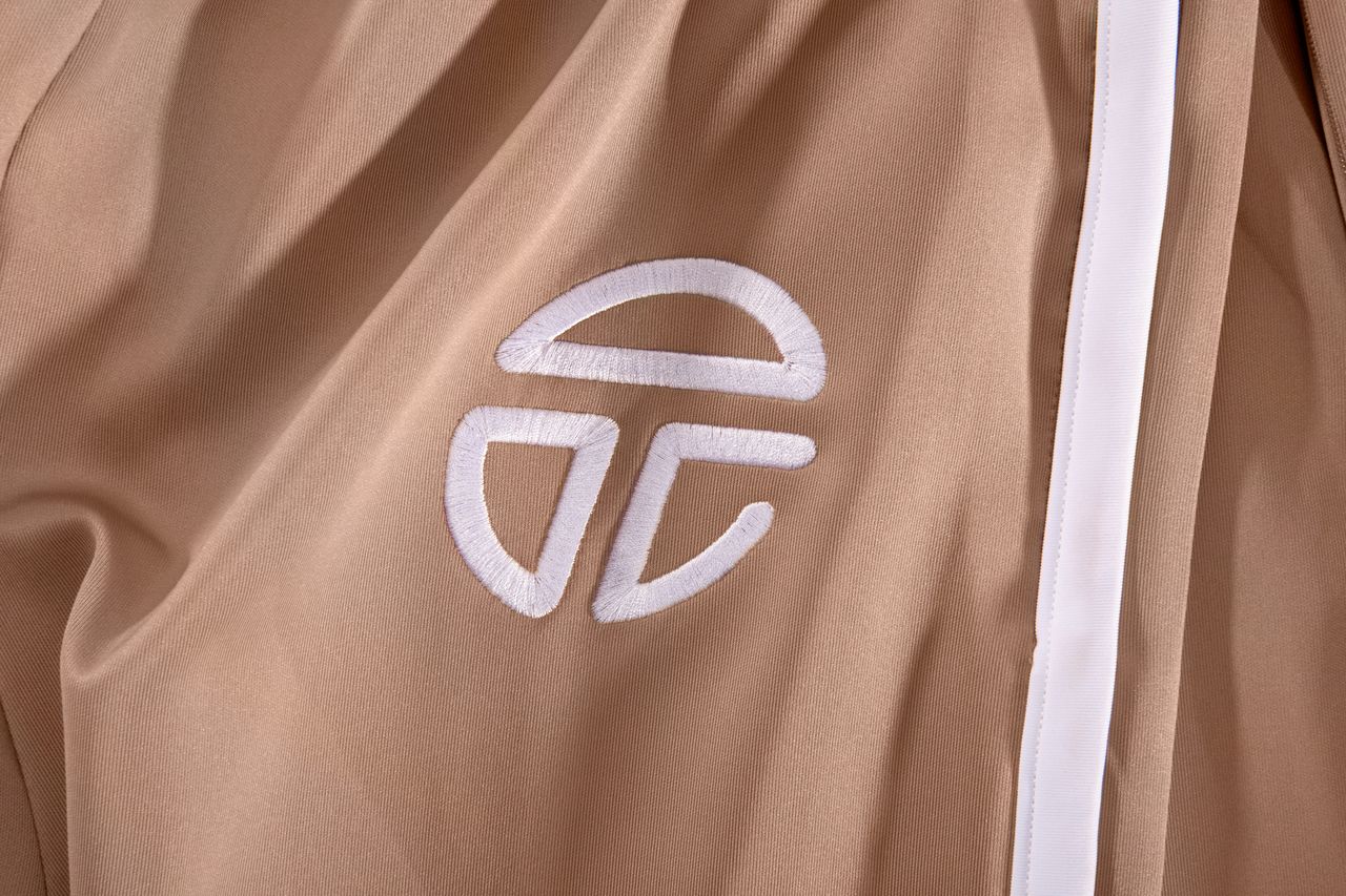 LIBERIA OLYMPIC SAND TRACK PANTS – BY TELFAR